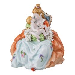The statuette "Lady with baby" orange dress