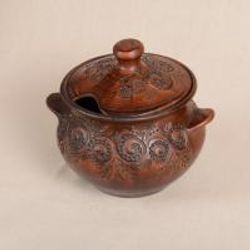 Tureen with handles and decor.