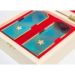 Souvenir "Shoulder straps" from zirconium in a box