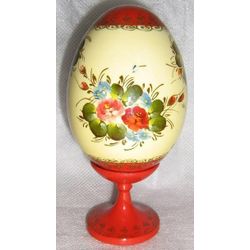 Decorative egg with hand painting and varnish on a leg height 140 mm