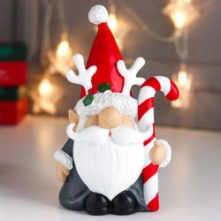 Сималенд / Souvenir "Santa Claus in a cap with deer antlers, with candy"