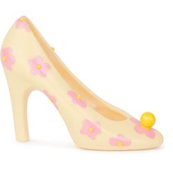 Sculpture of white chocolate "Shoe" with floral and bead