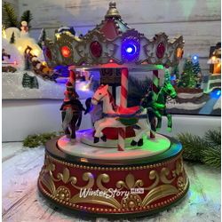 Kaemingk / Leuchtkomposition Silvesterkarussell de Sufran 22 * 19 cm, mit Uhrwerk und Musik, batteriebetrieben