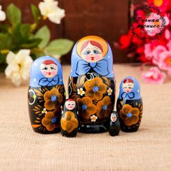 Matryoshka "Golden flowers" 5 dolls, blue scarf