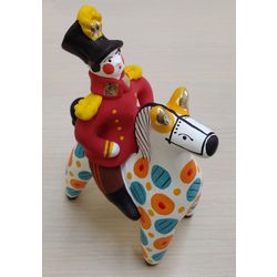 Дымковская глиняная игрушка / Figurine "Rider on a Horse in Red"