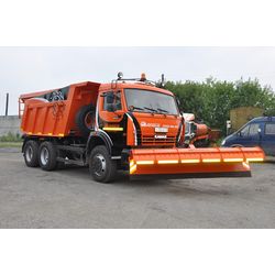 Snowplow on the KAMAZ-65115 dump truck