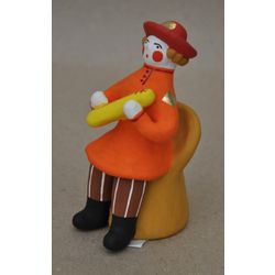 Дымковская глиняная игрушка / Figurine "Cavalier on a Chair"