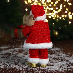 Зимнее волшебство / Doll "Santa Claus in a sweater and a shiny coat with white fur"