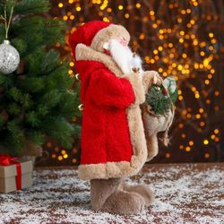 Зимнее волшебство / Doll "Santa Claus, in a red coat with gifts"