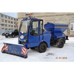 Universal machine UKM-2500 for year-round maintenance and cleaning of urban areas
