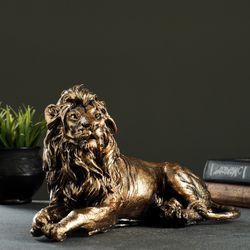 Хорошие сувениры / Piggy bank "Lion lying small"