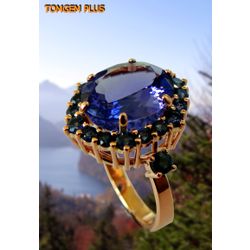 Gold ring 585 with tanzanite 10x12 mm and blue sapphires