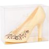 Sculpture of white chocolate "Shoe" with an ornament Sprig
