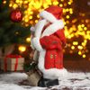 Зимнее волшебство / Doll "Santa Claus, in a red and white fur coat in a cage with gifts"