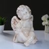 Хорошие сувениры / Candlestick "Angel sitting in the hand" 26x21x30 cm