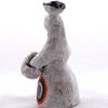 Kargopol clay toy is a Peasant with a basket