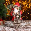 Зимнее волшебство / Doll "Santa Claus, in a red coat with skis"