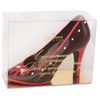 The sculpture of chocolate "Shoe" with a red bow