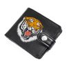 A purse with finished edges "Orange tiger" black