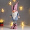 Сималенд / Interior doll "Santa Claus in a pink and blue dress, in a cap with ears"