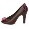 The sculpture of chocolate "Shoe" with a decorative flower