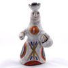 Kargopol clay toy is a Peasant with a basket