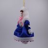 Потешный промысел / Christmas tree toy made of porcelain "Girl in a fur coat"