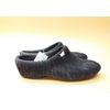 Women's Slippers of natural sheep wool with a metric of wood