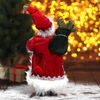 Зимнее волшебство / Doll "Santa Claus, in a red coat with a New Year's wreath"