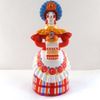 Дымковская глиняная игрушка / Figurilla "Señora con pan"