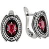 Ring and earrings in white gold with black. Bridges collection