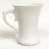Ceramic mug with a relief image of a cute dog