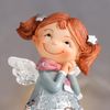 Сималенд / Souvenir "Baby angel in a New Year's dress with reindeer"