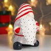 Сималенд / Souvenir "Santa Claus, gray caftan, striped cap, with a bell"