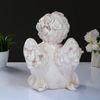 Хорошие сувениры / Candlestick "Angel sitting in the hand" 26x21x30 cm