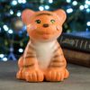 Хорошие сувениры / Piggy bank "Satisfied tiger cub"