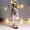 Сималенд / Interior doll "Moosie in a beige jumpsuit in a cage, a gray vest and a cap"