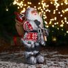 Зимнее волшебство / Doll "Santa Claus in a white-red fur coat with a strap, with skis"