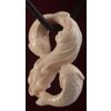 Mammoth ivory fish pendants