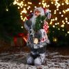 Зимнее волшебство / Doll "Santa Claus in a white-red fur coat with a strap, with skis"