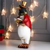 Сималенд / Souvenir "Penguin in a red dress coat, in a top hat, with a book"