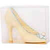 Sculpture of white chocolate "Shoe" with marzipan bead