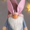 Сималенд / Interior doll "Santa Claus in a pink and blue dress, in a cap with ears"