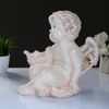Хорошие сувениры / Candlestick "Angel sitting in the hand" 26x21x30 cm
