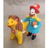 Дымковская глиняная игрушка / Figurine "Trainer"