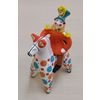 Дымковская глиняная игрушка / Figurine "Rider on a horse in a red officer's tunic"