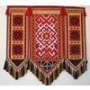 Productos de recuerdo de Mordovia: manteles, toallas, servilletas con bordados.